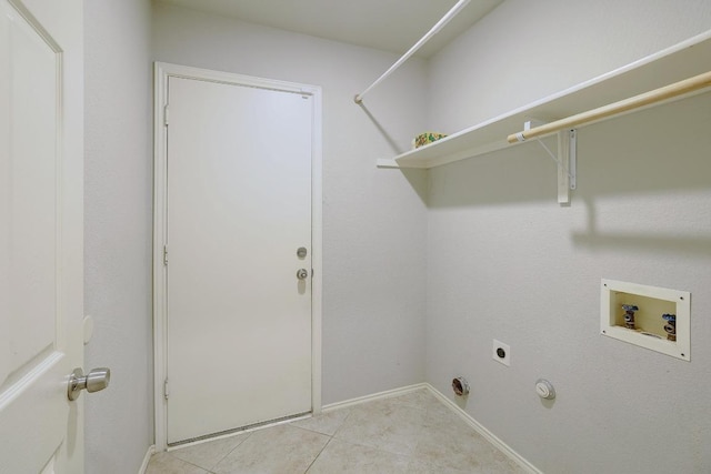 17729 Cahir Glen Cv, Pflugerville, TX 78660 - laundry room with hookup for a washing machine, electric dryer hookup, light tile patterned floors, and hookup for a gas dryer