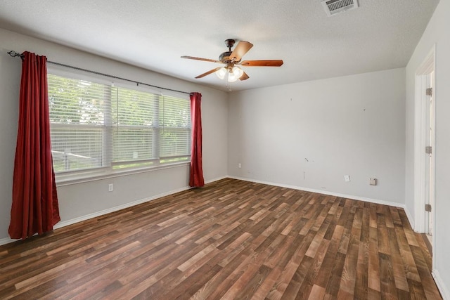 17729 Cahir Glen Cv, Pflugerville, TX 78660 - unfurnished room featuring ceiling fan, wood finished floors, and a textured ceiling
