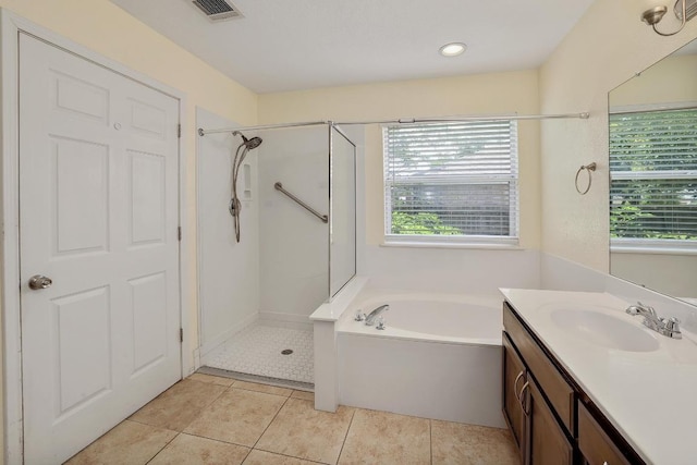 17729 Cahir Glen Cv, Pflugerville, TX 78660 - full bath featuring a garden tub, walk in shower, healthy amount of natural light, and vanity