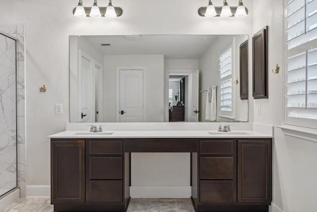 7016 Lickeen Ct, Austin, TX 78744 - full bath featuring a marble finish shower and double vanity