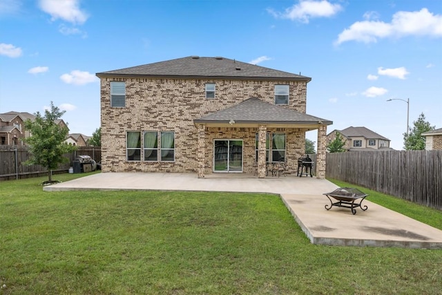 7016 Lickeen Ct, Austin, TX 78744 - back of property featuring a patio, a fenced backyard, brick siding, and roof with shingles