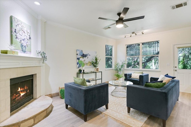 1303UNIT13A N Cuernavaca Dr Unit A13, Austin, TX 78733 - living room featuring wood finished floors, a high end fireplace, ornamental molding, ceiling fan, and recessed lighting