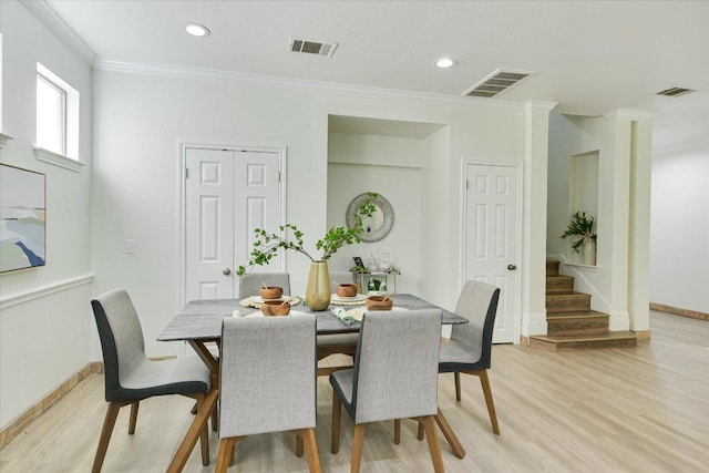 1303UNIT13A N Cuernavaca Dr Unit A13, Austin, TX 78733 - dining area featuring light wood-type flooring, crown molding, stairs, and recessed lighting