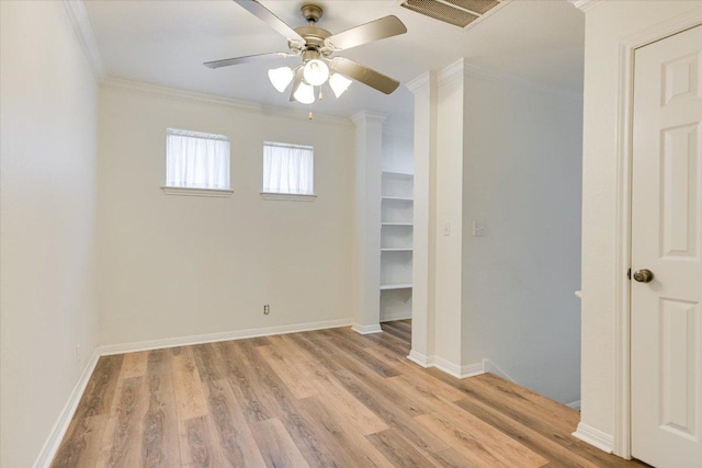 1303UNIT13A N Cuernavaca Dr Unit A13, Austin, TX 78733 - empty room with crown molding, light wood-style flooring, and a ceiling fan