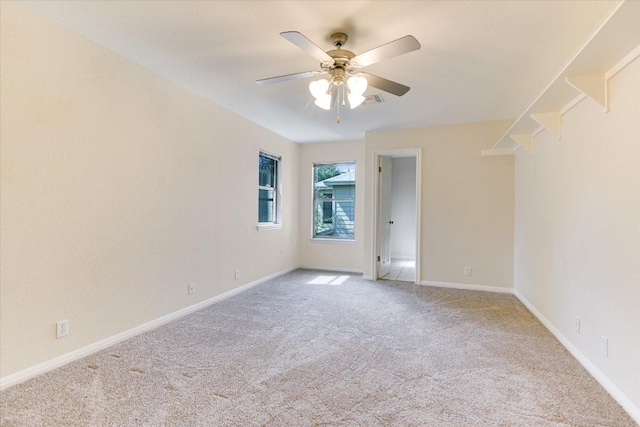 1303UNIT13A N Cuernavaca Dr Unit A13, Austin, TX 78733 - unfurnished room featuring light colored carpet and a ceiling fan