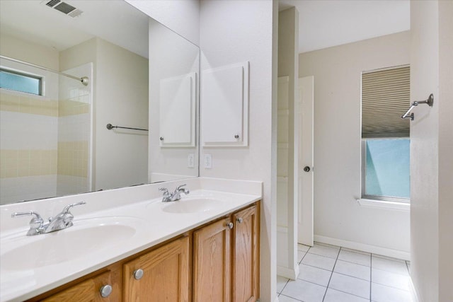 1303UNIT13A N Cuernavaca Dr Unit A13, Austin, TX 78733 - bathroom with tile patterned floors, double vanity, and a tile shower