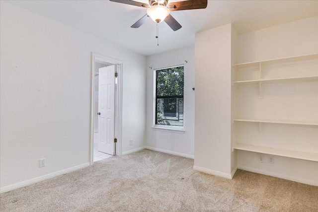 1303UNIT13A N Cuernavaca Dr Unit A13, Austin, TX 78733 - unfurnished bedroom featuring carpet flooring, ensuite bath, and a ceiling fan