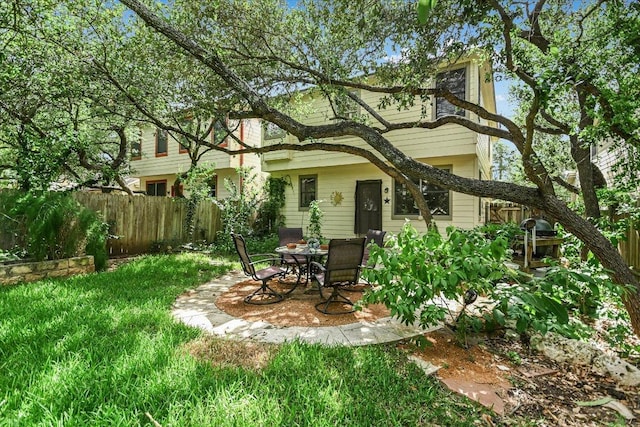 1303UNIT13A N Cuernavaca Dr Unit A13, Austin, TX 78733 - back of house featuring a patio area