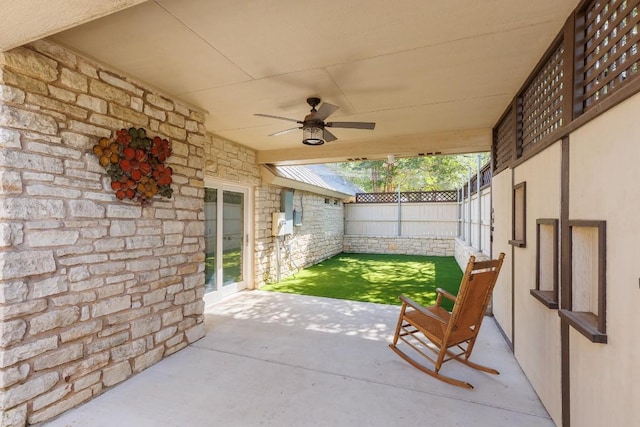 110 Lost River Rd, Georgetown, TX 78628 - fenced backyard featuring ceiling fan and a patio