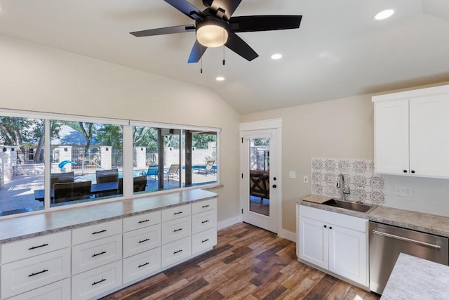 110 Lost River Rd, Georgetown, TX 78628 - kitchen with dishwasher, lofted ceiling, recessed lighting, dark wood finished floors, and light countertops