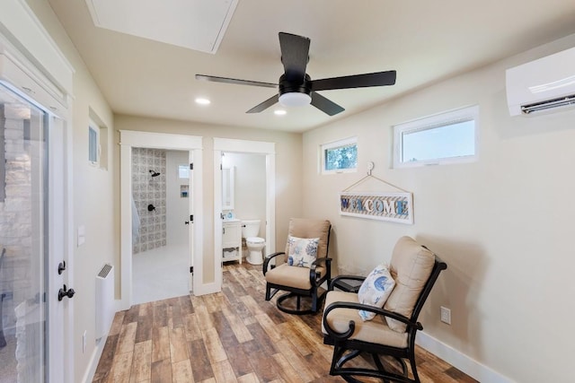 110 Lost River Rd, Georgetown, TX 78628 - living area featuring an AC wall unit, light wood-style floors, a ceiling fan, and recessed lighting