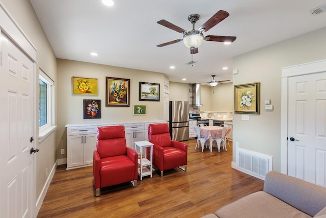 110 Lost River Rd, Georgetown, TX 78628 - living room featuring ceiling fan, wood finished floors, and recessed lighting