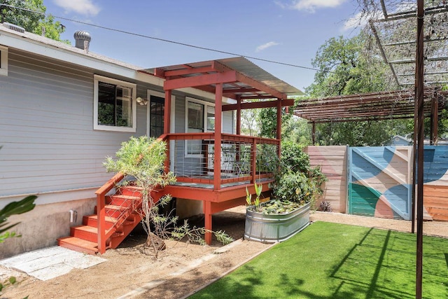 1140 Leona St, Austin, TX 78702 - wooden deck with a lawn