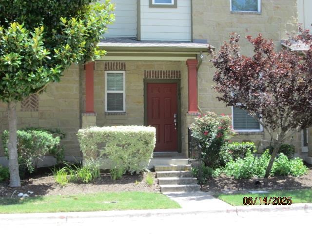 1004 Lost Pines Ln, Cedar Park, TX 78613 - view of exterior entry with stone siding