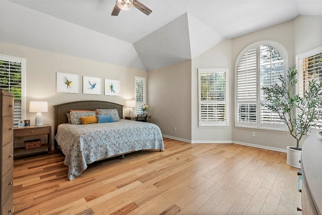 10628 Indigo Broom Loop, Austin, TX 78733 - bedroom featuring light wood-style floors, vaulted ceiling, and a ceiling fan