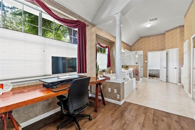 10628 Indigo Broom Loop, Austin, TX 78733 - home office with decorative columns, vaulted ceiling, and wood finished floors