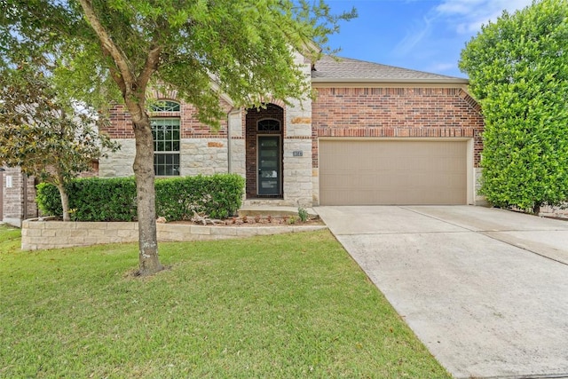 18517 Tanner Bayou Loop, Austin, TX 78738 - view of front facade featuring a garage, driveway, a front yard, brick siding, and roof with shingles