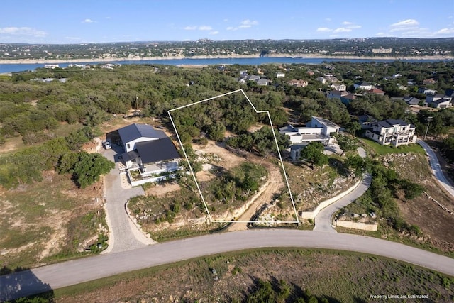 18509 Sugar Maple Dr, Lago Vista, TX 78645 - aerial view of property and surrounding area featuring property parcel outlined and a nearby body of water