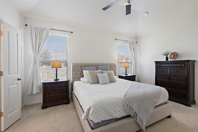 22300 Chipotle Pass, Spicewood, TX 78669 - bedroom featuring light carpet, lofted ceiling, and ceiling fan