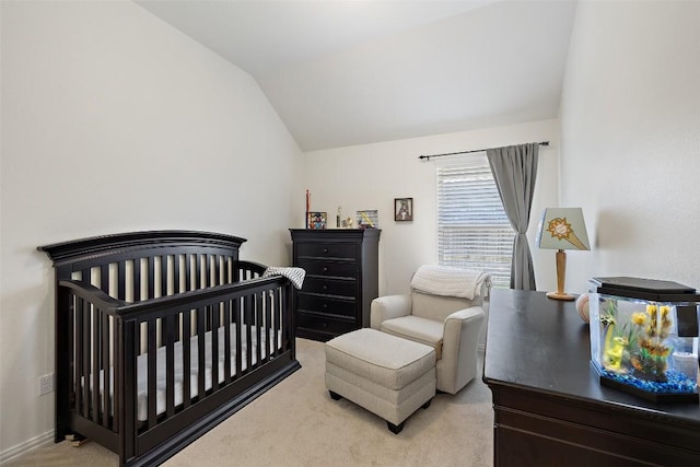 22300 Chipotle Pass, Spicewood, TX 78669 - bedroom with light colored carpet, lofted ceiling, and a crib