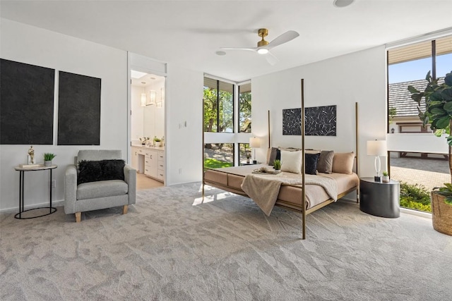 821 Malabar St, Austin, TX 78734 - bedroom with carpet floors, a ceiling fan, and ensuite bathroom