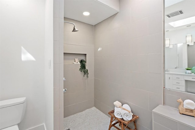 821 Malabar St, Austin, TX 78734 - bathroom featuring vanity and a tile shower