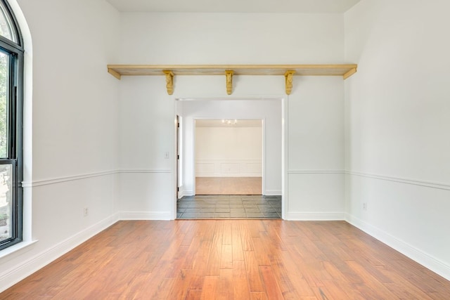 10701 Glass Mountain Trl, Austin, TX 78750 - unfurnished room with light wood finished floors and baseboards