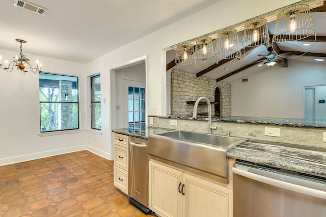 10701 Glass Mountain Trl, Austin, TX 78750 - kitchen with stainless steel dishwasher, tasteful backsplash, a ceiling fan, and dark stone counters