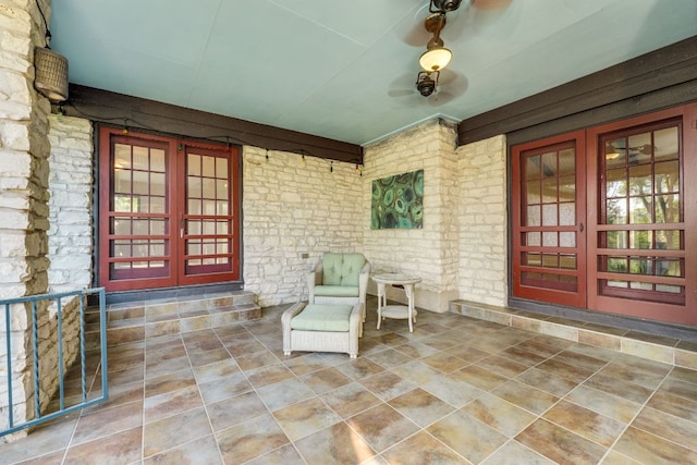 10701 Glass Mountain Trl, Austin, TX 78750 - property entrance featuring french doors, stone siding, and a patio area