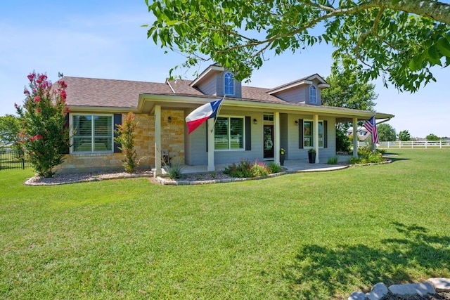 30112 Twin Creek Dr, Georgetown, TX 78626 - view of front of home with stone siding, a porch, and a shingled roof