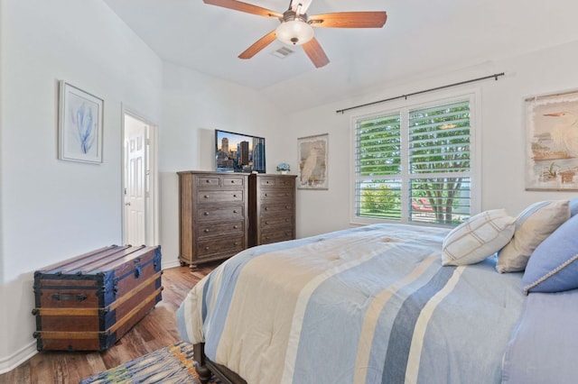 30112 Twin Creek Dr, Georgetown, TX 78626 - bedroom with wood finished floors, lofted ceiling, and ceiling fan