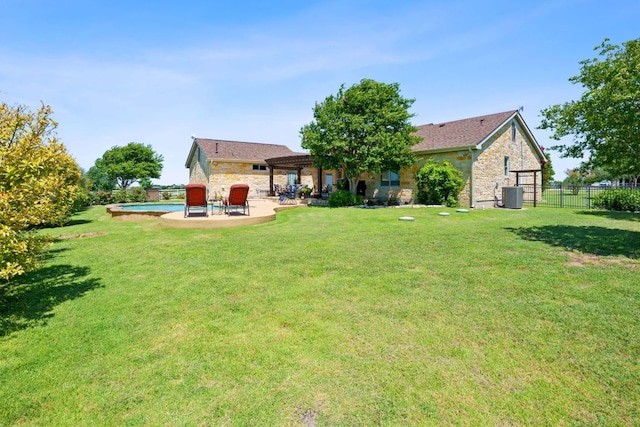 30112 Twin Creek Dr, Georgetown, TX 78626 - back of house with stone siding, a patio, and a swimming pool