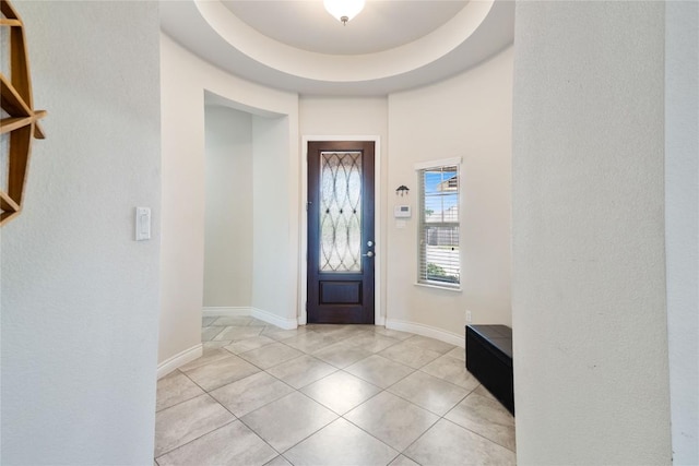 136 W Highfield St, Hutto, TX 78634 - foyer entrance with light tile patterned floors and baseboards