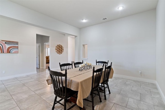 136 W Highfield St, Hutto, TX 78634 - dining space with light tile patterned flooring and recessed lighting