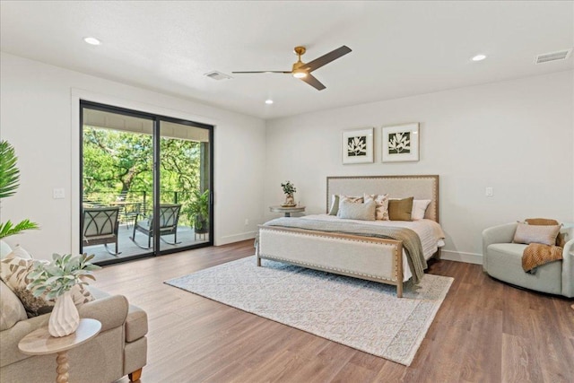 202 Hub Dr, Wimberley, TX 78676 - bedroom featuring access to outside, wood finished floors, recessed lighting, and a ceiling fan