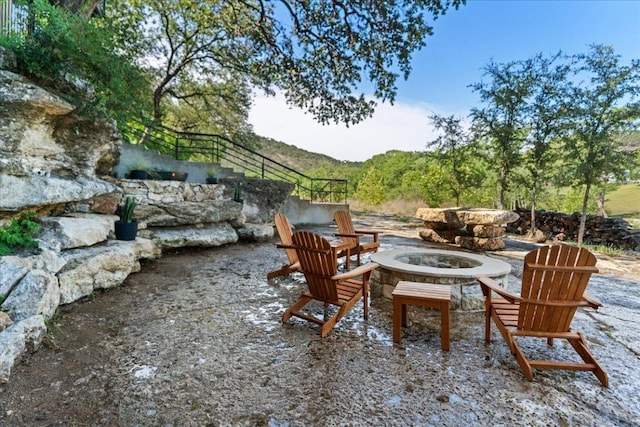 202 Hub Dr, Wimberley, TX 78676 - view of patio with a fire pit