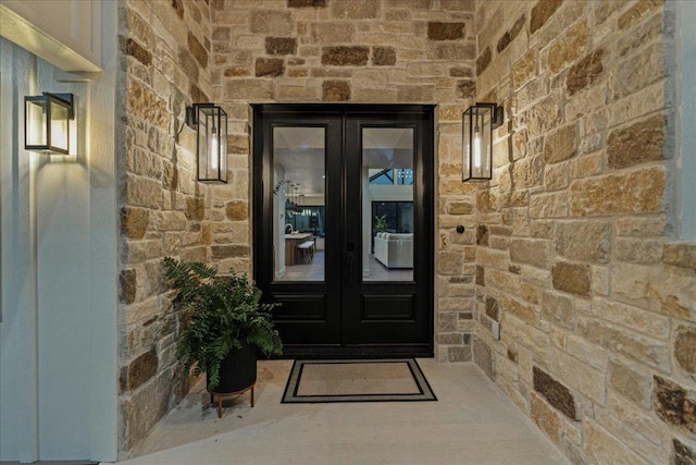 202 Hub Dr, Wimberley, TX 78676 - view of exterior entry featuring french doors