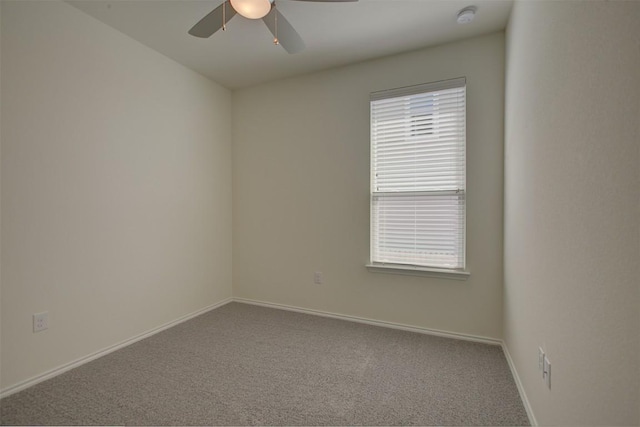 7517 Ballydawn Dr, Austin, TX 78744 - empty room with ceiling fan, a smoke detector, and carpet flooring