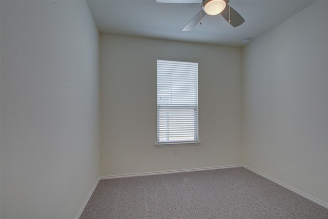 7517 Ballydawn Dr, Austin, TX 78744 - carpeted empty room with a ceiling fan and baseboards