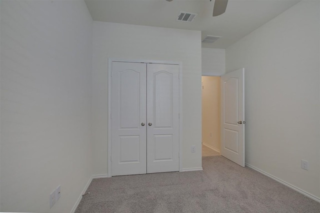 7517 Ballydawn Dr, Austin, TX 78744 - unfurnished bedroom featuring carpet floors, a closet, and a ceiling fan