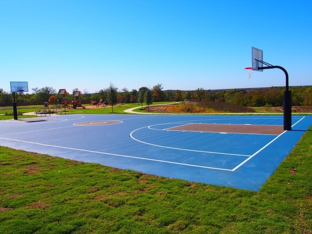 7517 Ballydawn Dr, Austin, TX 78744 - view of basketball court featuring community basketball court and a lawn
