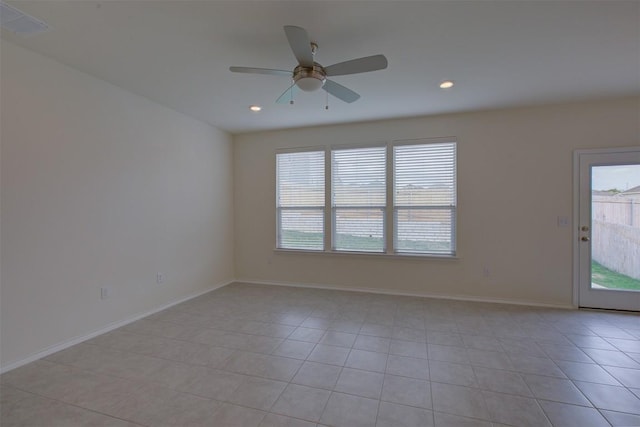 7517 Ballydawn Dr, Austin, TX 78744 - unfurnished room with light tile patterned floors, ceiling fan, and recessed lighting