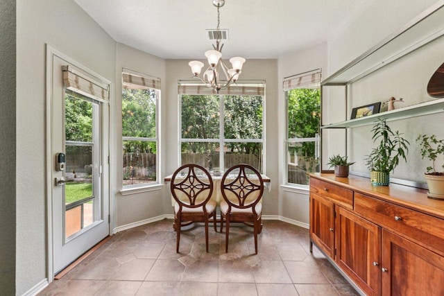4005 Travis Country Cir, Austin, TX 78735 - sunroom with healthy amount of natural light and a chandelier