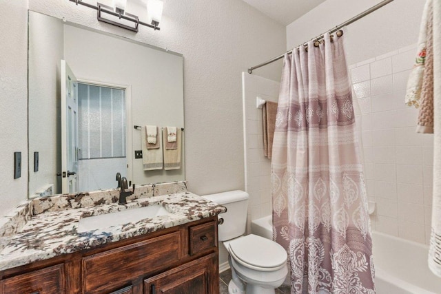 4005 Travis Country Cir, Austin, TX 78735 - full bath featuring shower / bath combo with shower curtain, vanity, and a textured wall