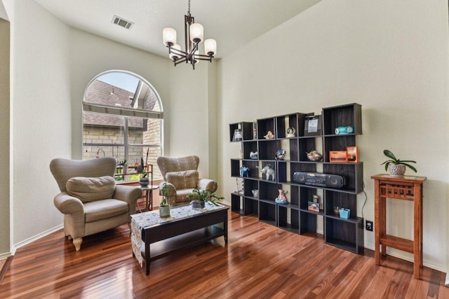 4005 Travis Country Cir, Austin, TX 78735 - sitting room with a chandelier and wood finished floors