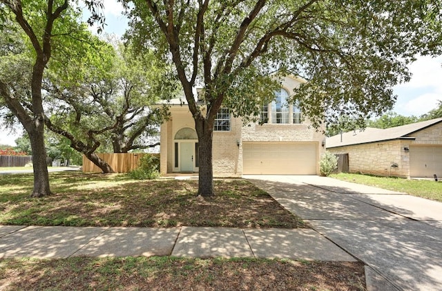4460 Bremner Dr, Austin, TX 78749 - view of front facade featuring driveway and an attached garage