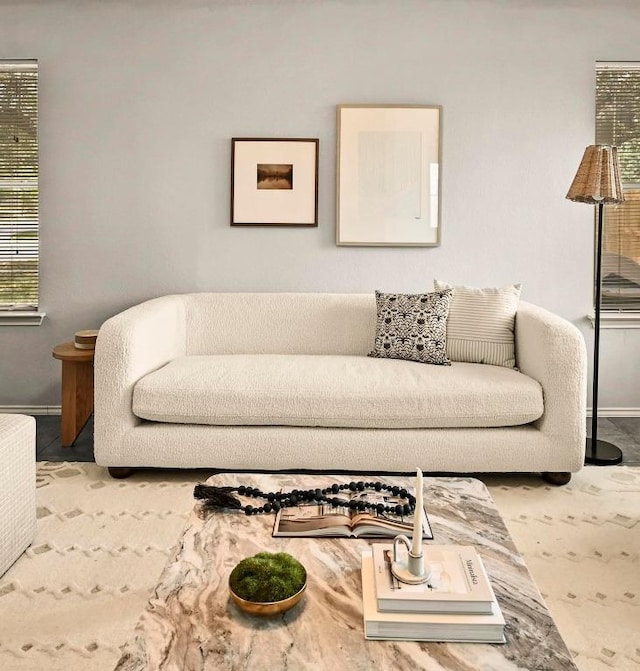 4460 Bremner Dr, Austin, TX 78749 - carpeted living room with baseboards