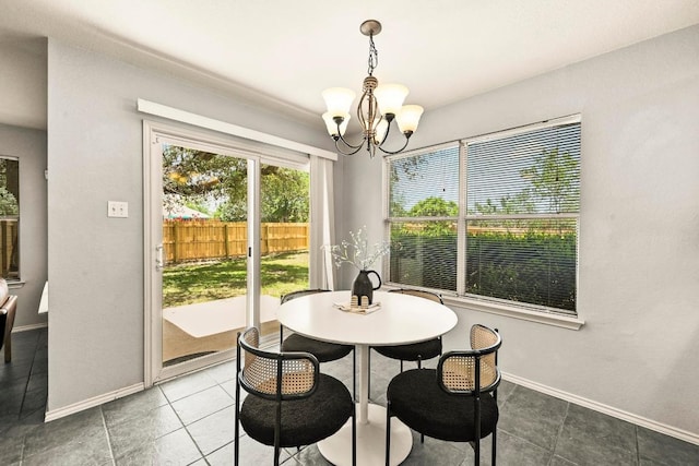 4460 Bremner Dr, Austin, TX 78749 - dining space featuring a chandelier and tile patterned floors