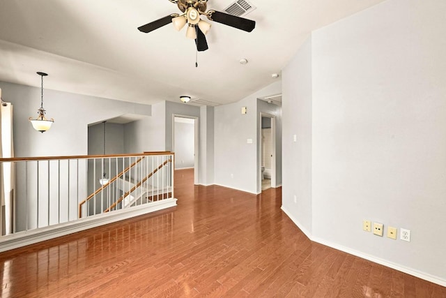 4460 Bremner Dr, Austin, TX 78749 - spare room with wood finished floors and ceiling fan