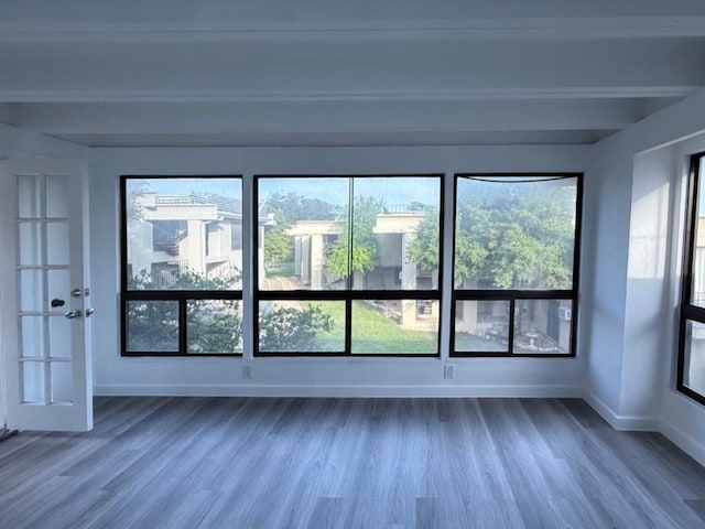 5916 Lago Vista Way Unit B16, Leander, TX 78645 - spare room with beamed ceiling, dark wood-style floors, and plenty of natural light